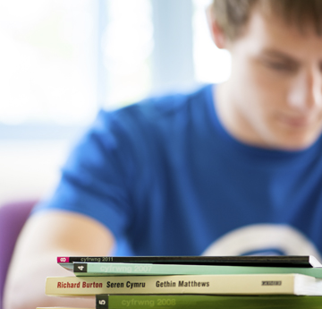 Student working by a desk