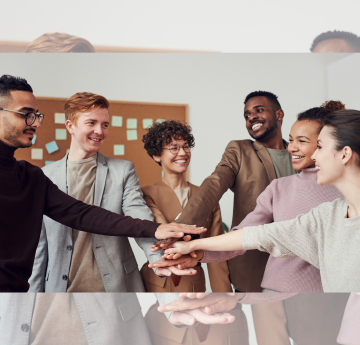 A group of colleagues in a huddle