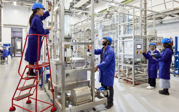 Chemical engineering students in the pilot lab