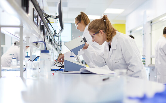 Female student in Chemistry laboratory 