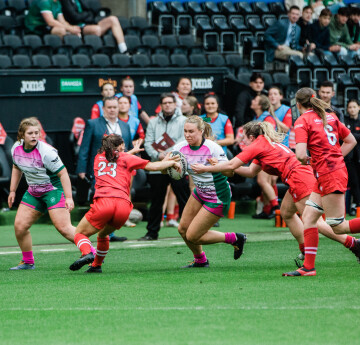 women playing rugby