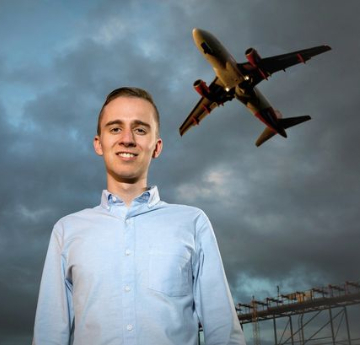 man with plane flying over head