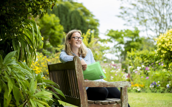 student sitting on bench