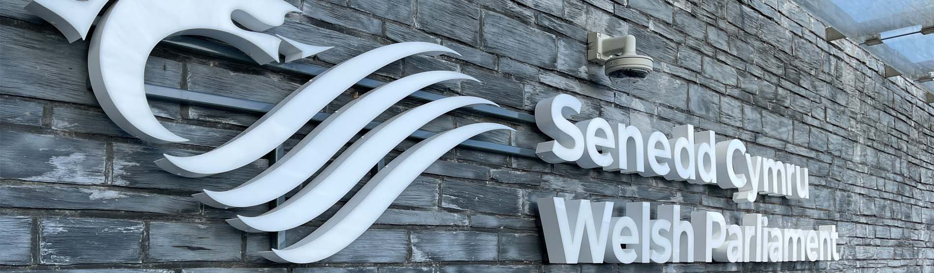 The outside walls of the Senedd in Cardiff