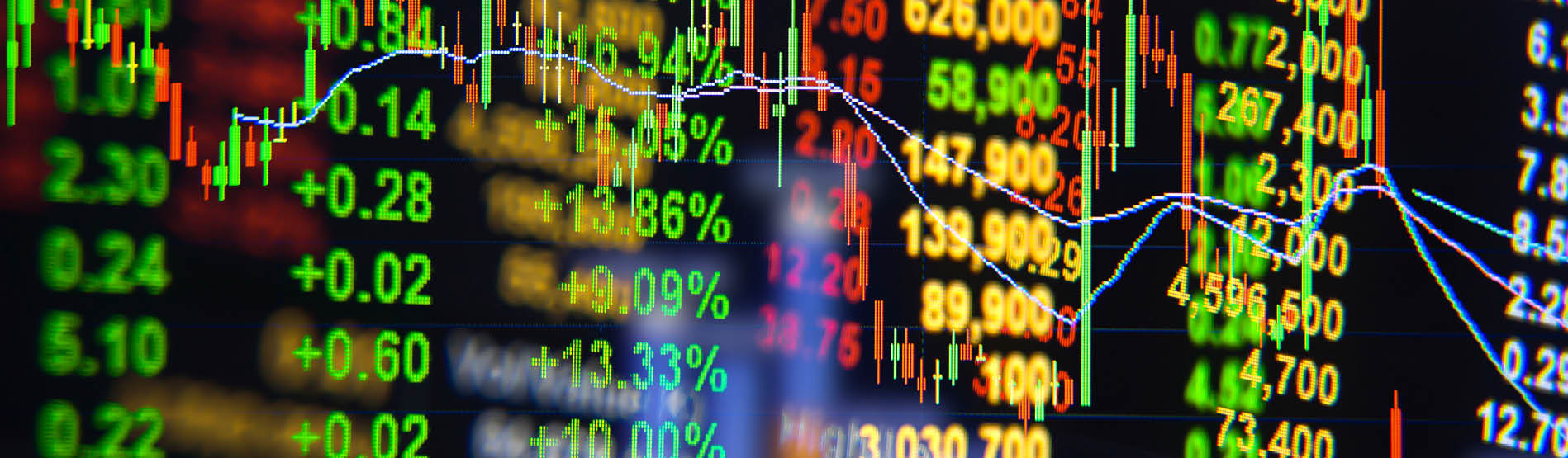 stock market figures on a board