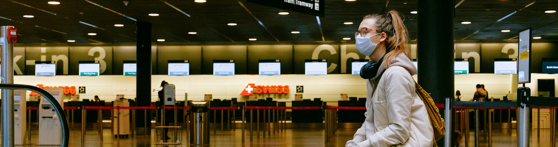 Girl in mask in airport