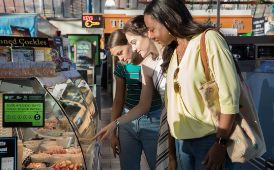 international students shopping at a local market