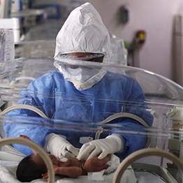 Nurse with baby. Copyright: Reuters | Luis Cortez