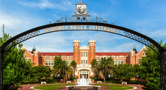 Florida State University written on a gate on the way into the campus