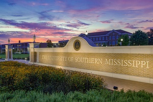 Centennial gateway of the university with university name written on it