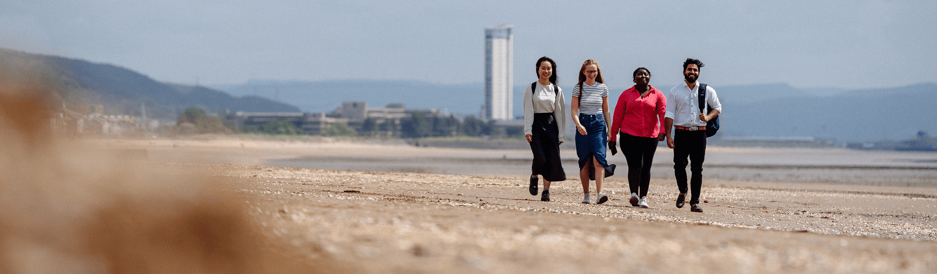 International students on the beach