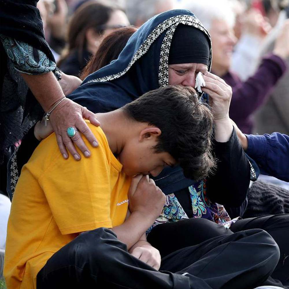 Members of the Muslim community attend the National Remembrance Service at North Hagley Park in Christchurch on March 29, 2019