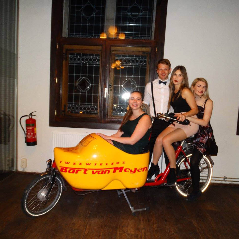 Ed and a group of friends attending a black tie event