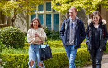 Student walking though Singleton Campus