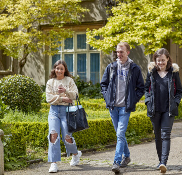 Students walking in front of Abbey