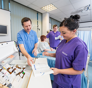 Image of nurses being trained in a model hospital setting