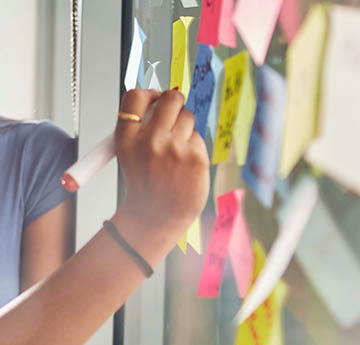 sticky notes on a board