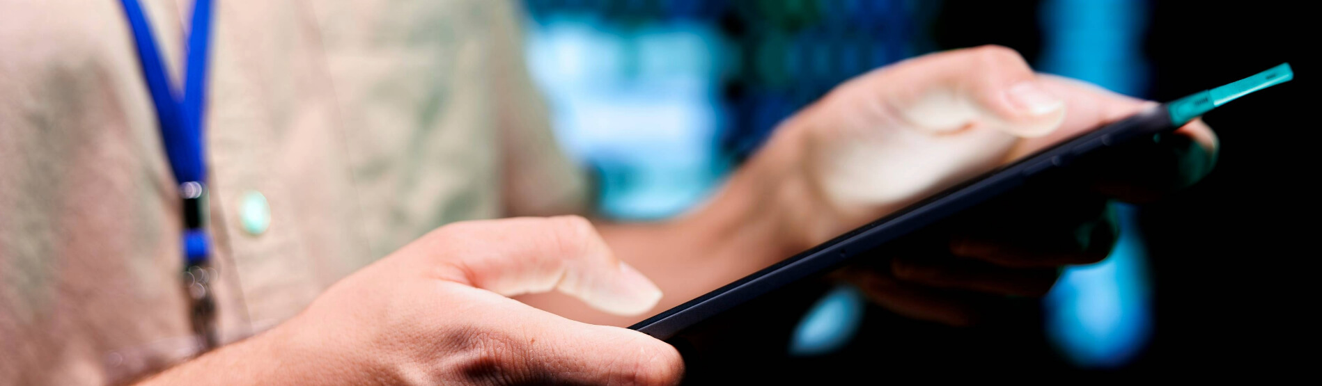 Man holding tablet in a operations management role