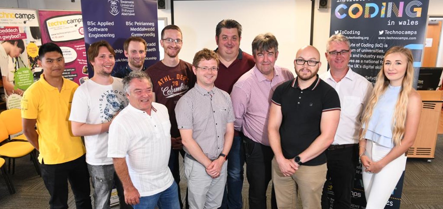 Group shot of degree apprenticeship graduates.