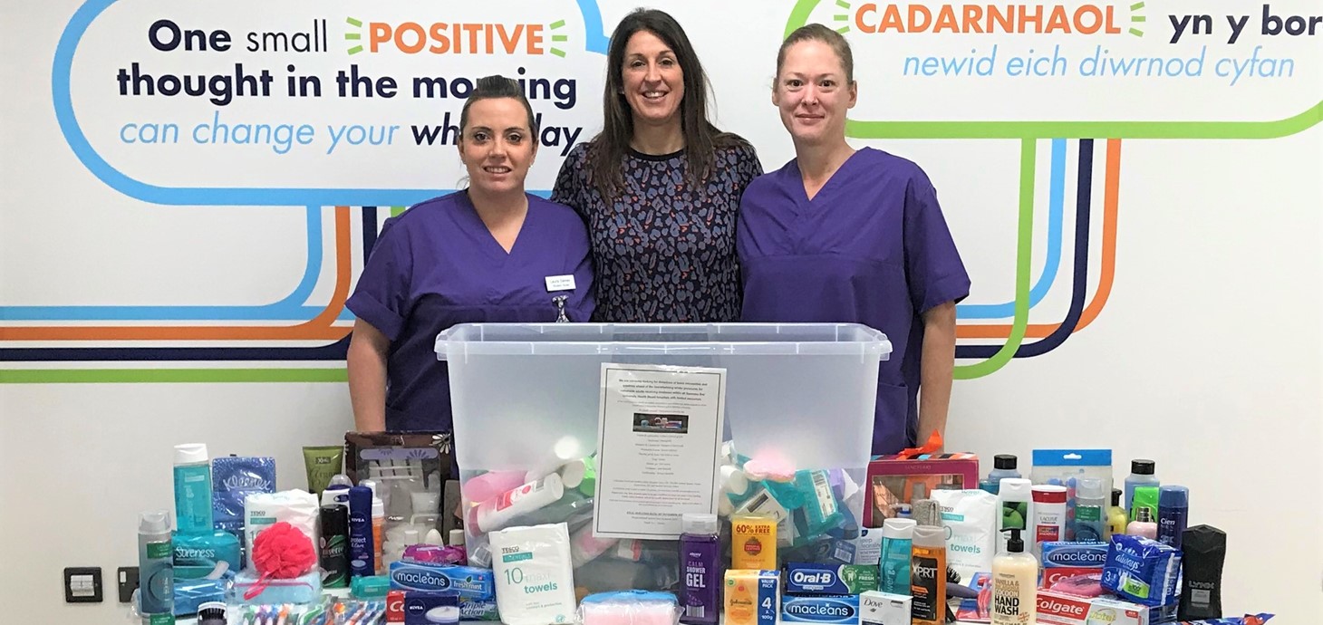 A Swansea University adult nursing students Laura Davies and Carina Jones with Catherine Williams, Swansea University's Programme Director for Pre-registration Nursing.