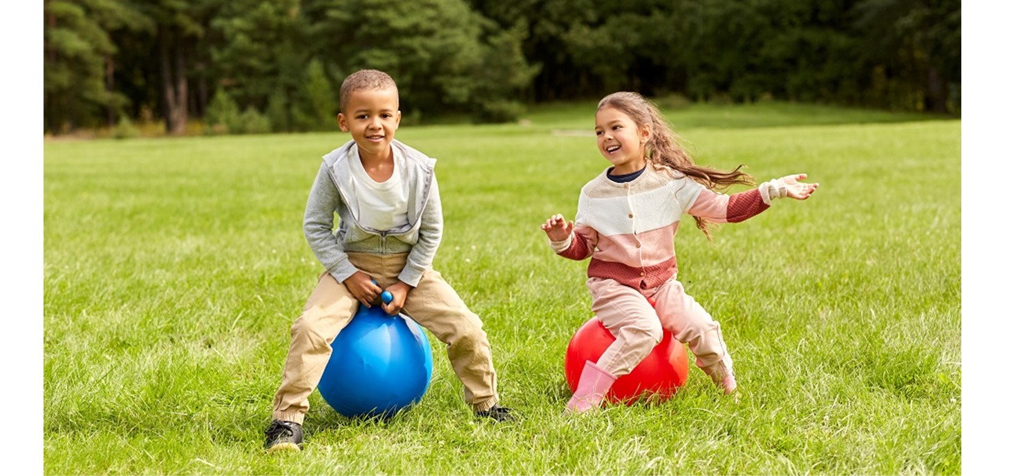 Children bouncing on space hoppers: Three researchers in children’s physical activity and health presented their work at a major international conference hosted by Swansea University, supported by awards from the Worshipful Livery Company of Wales.