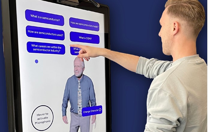The kiosks allow users to engage with AI through voice commands. Users can speak directly to AI personas, Professor Chip and Professor Nano, to ask questions and learn about semiconductor technology.