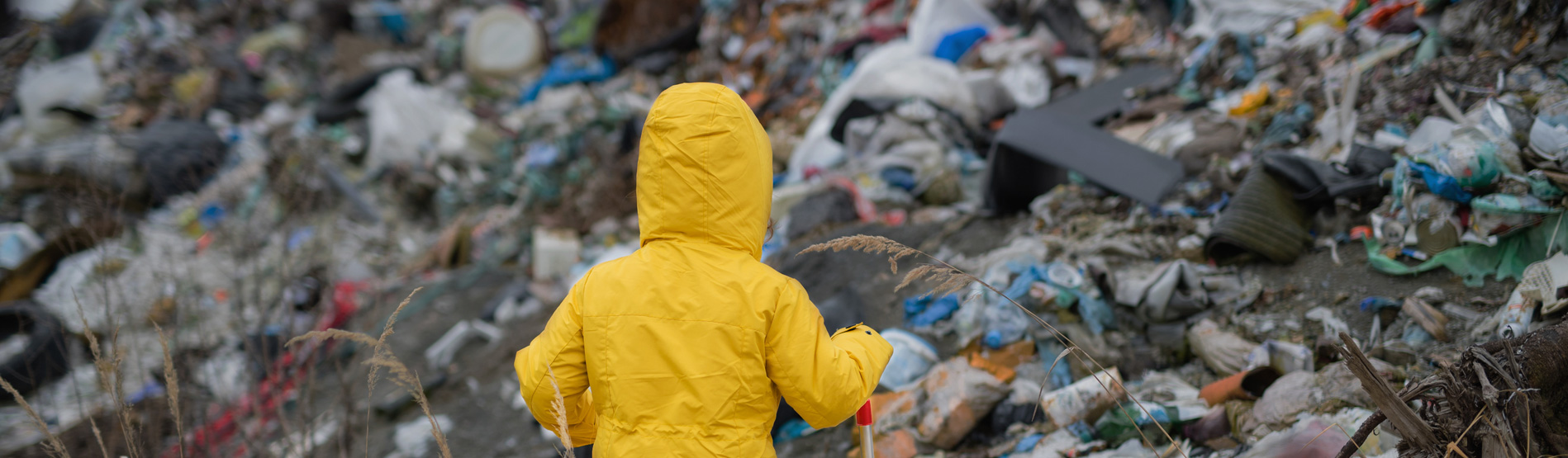 Girl playing in plastic waste