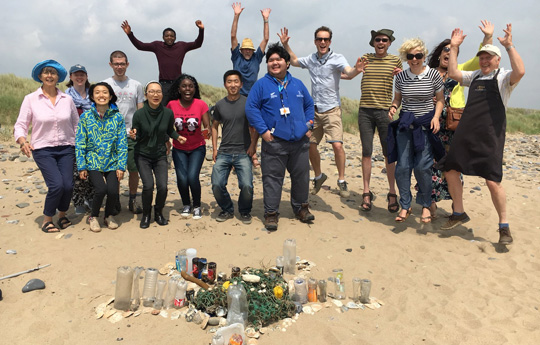 People on the beach after a beach clean