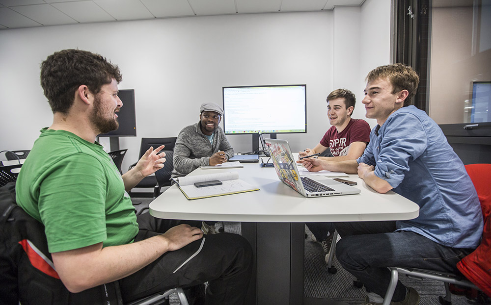 students sitting around a table