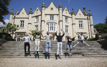 students in fron of the abbey building