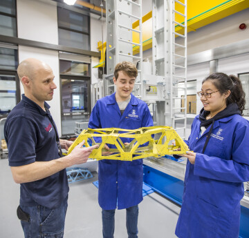 Students and Lab technicians in the structures lab