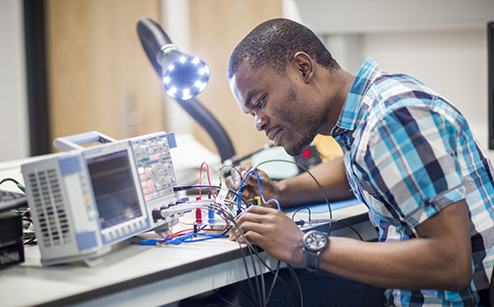 student in electrical laboratory