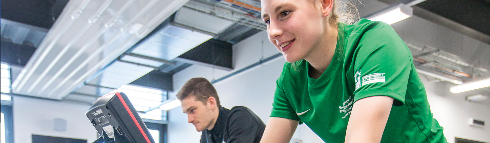 Sport and Exercise Science students on bikes.